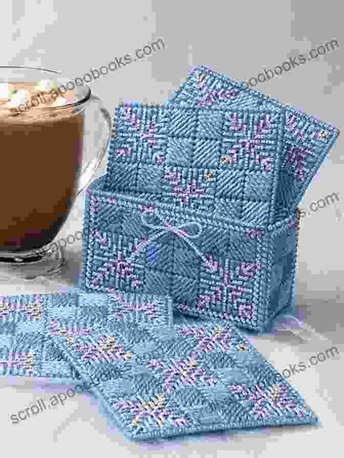 A Set Of Four Snowflake Coasters Made From Plastic Canvas And Yarn. Snowflake Coaster Set: Plastic Canvas Pattern