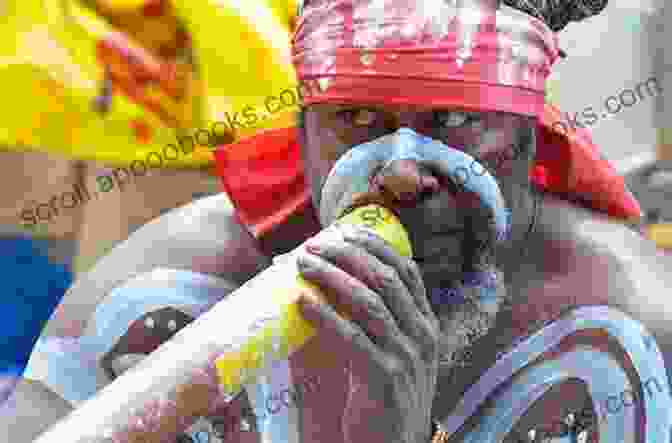 Close Up Of An Aboriginal Man Playing The Didgeridoo The Place Of Music In The Australian Aboriginals Way Of Life