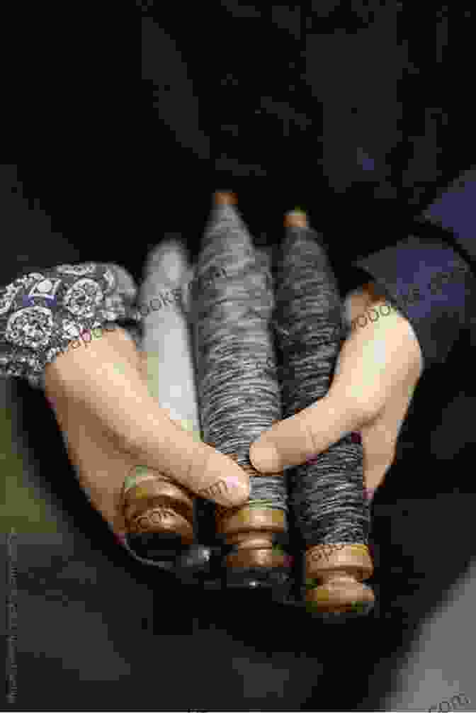 Close Up Of Hands Manipulating Threads On Bobbins A Manual Of Hand Made Bobbin Lace Work