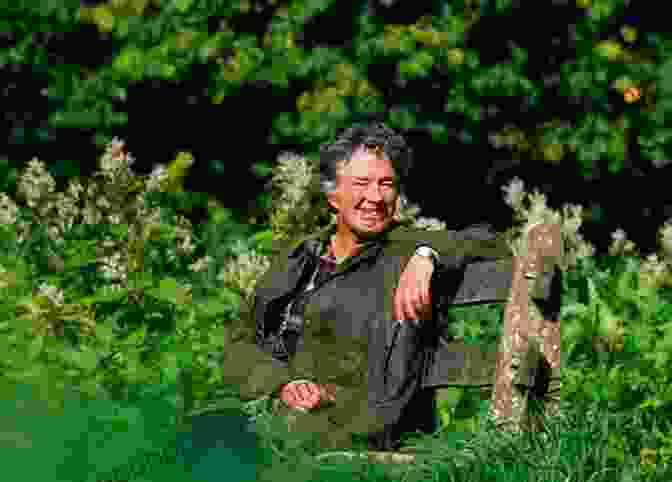 Dervla Murphy Sitting On The Ground, Surrounded By A Group Of Smiling Cameroonian Villagers Cameroon With Egbert Dervla Murphy