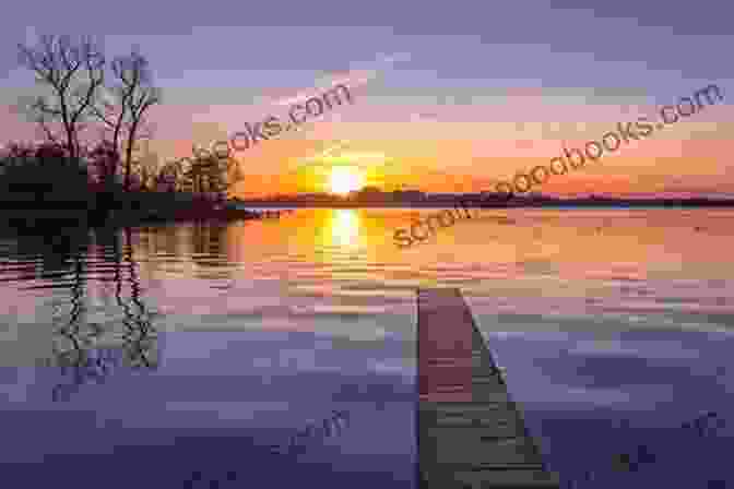 Serene Sunset Over A Tranquil Lake Wanderlust Stephen McNamee